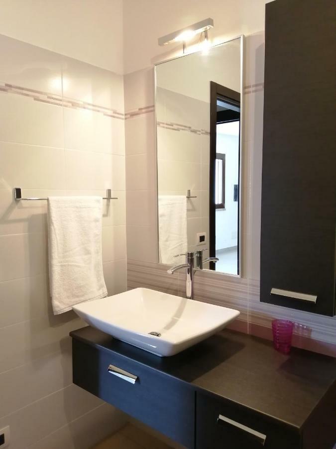 Casa Il Cortile Fiorito Apartman Tortolì Kültér fotó